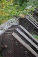 Old stopper at the end of railtrack with defocusing effect. photo