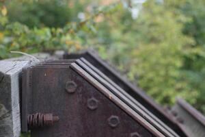 Old stopper at the end of a railtrack with defocusing effect photo