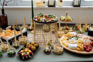 The beautifully arranged dining table features a vibrant array of diverse foods, providing unique flavors for an unforgettable culinary experience that delights all guests photo