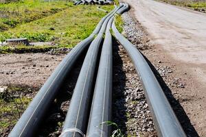 Industrial pipes are essential for construction sites, providing utility installation for infrastructure and development projects. They ensure safety and progress in civil engineering tasks photo