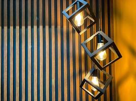 This stylish modern pendant lighting features a stunning geometric design that complements a contemporary interior setting beautifully, adding elegance and charm photo