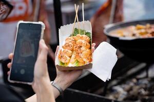 Indulge in the delectable Grilled Shrimp on Skewers, an absolute musttry dish at the vibrant Street Food Market today photo