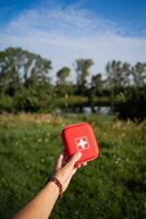An Outdoor First Aid Kit is essential for ensuring emergency preparedness when enjoying activities or exploring in natural settings, providing necessary supplies photo