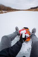 Get ready for a Winter Adventure filled with excitement enjoy a thrilling ice sledding experience on a scenic frozen river that promises to be unforgettable and breathtaking photo