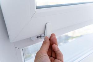 Enhance your home security by learning the proper operation of modern window locks to effectively protect against potential intruders photo