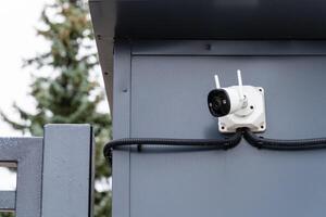 A security camera has been installed on a building for monitoring photo