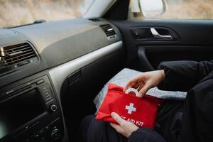 Having a First Aid Kit in your car is essential for effective emergency preparedness and ensuring safety during unforeseen situations photo