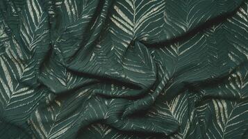 Green Fabric with Gold Leaf Pattern Background for Luxury and Elegant Design Projects photo
