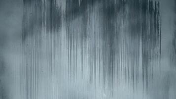 Abstract Vertical Dripping Paint Stains on Weathered Gray Wall with Textured Surface photo