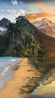 Tropical Beach with Palms and Jungle Merging into Snowy Mountain Landscape at Sunset Reflection in Water photo