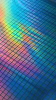 Abstract Technology Background with Colorful Rainbow Reflection on Grid Pattern in Blue Light photo