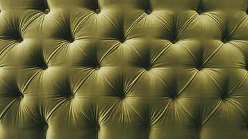 Luxurious Olive Green Upholstered Tufted Fabric Texture with Button Details in Soft Light photo
