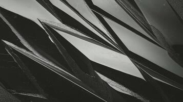 Abstract Dark Metallic Sharp Geometric Shapes with Reflective Glass Edges and Textured Background photo
