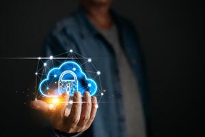 man holding cloud computing diagram show on hand. Data storage.Cloud technology.Secure backup Networking and internet service concept.Implementation storage technology in business. IT support. photo