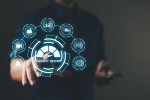 hand touch hologram credit report score to plan in e-business, and buy or purchase produce payment online. The concept of finance and online shopping. photo
