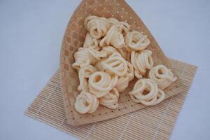Fresh made Prawn Crackers on bamboo mat photo