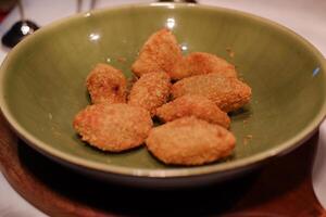 Golden Crispy Chicken Bites in a Bowl photo