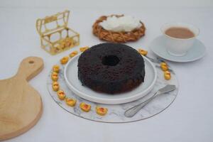 chocolate cake with beautiful decoration on white background photo