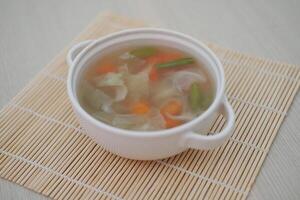 Fresh soup with carrots and cabbage. Refreshing for the body photo