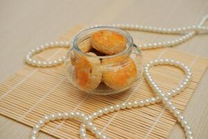 round peanut cookies in a jar photo