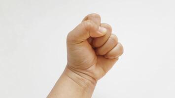 Human fist isolated on white background photo
