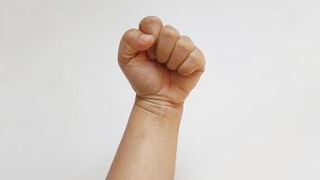 Human fist. Gesture emotion spirit isolated on white background photo