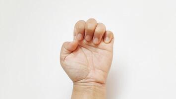 A woman hand gesture concept. Isolated on white background photo