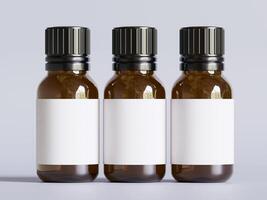 Three empty bottles of essential oil on a white background photo