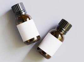 Two bottles of essential oil on a white surface photo
