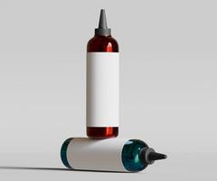 Two bottles of ink are on a gray background photo