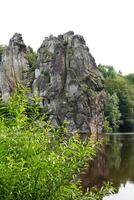 Externsteine sandstone rock formation in Germany photo
