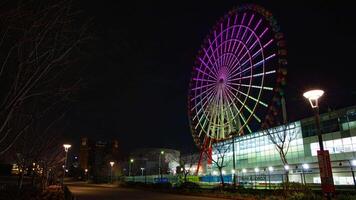 Ferris wheel at night in Odaiba Tokyo time lapse video