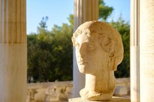 Bust in the Stoa of Attalos building at the Ancient Agora in Athens, Greece in the Stoa of Attalos building at the Ancient Agora in Athens, Greece photo