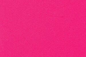 Bright pink fabric texture with smooth surface and vivid color for textile design and fashion inspiration. photo