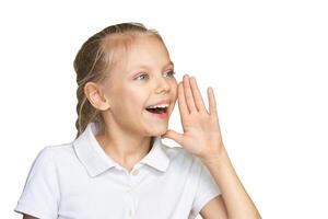 Caucasian young girl shouting cheerfully in white polo, expressive joy and communication. photo