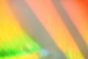Abstract blur of vibrant colors creating a dynamic rainbow effect with soft gradient shadows. photo