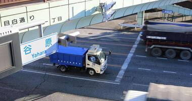Rushing cars on the street at the downtown in Tokyo daytime video