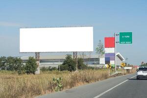Large horizontal blank sign on a highway in Bangkok, Thailand. Traffic and sky. Blank billboard on the highway. Clipping path. photo