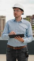 Builder Engineer Working with Digital Tablet on Construction Site video