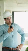 Construction Engineer Communicating via Radio on Job Site video