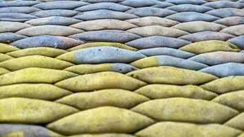 Sandbags arranged in rows photo