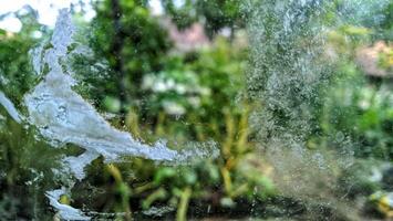 Dirty window with sticker residue photo