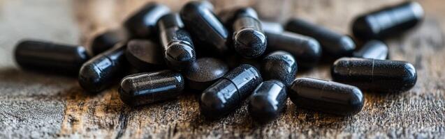 Supplements scattered on a wooden surface for health and wellness photo