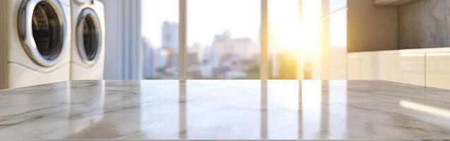 Laundry room with modern appliances and city view during sunset photo