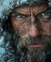 Intense expression of a rugged explorer in a snowy wilderness landscape photo