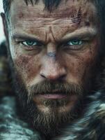 Intense portrait of a warrior in rugged attire with striking blue eyes photo