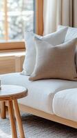 Soft textures and natural light enhance the cozy living room atmosphere photo