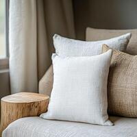 Cozy living room corner with decorative pillows on a sofa photo
