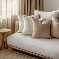 Cozy living room corner with soft pillows and natural lighting in modern design photo