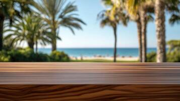 Coastal view with palm trees and a wooden table overlooking the beach photo
